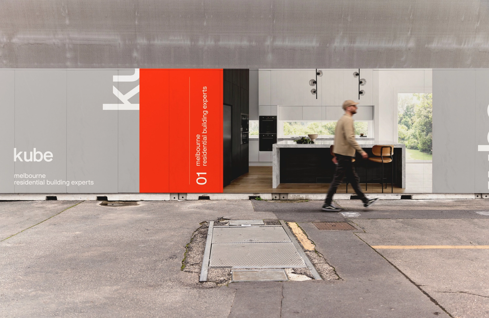 Construction site hoarding carrying a branded identity system